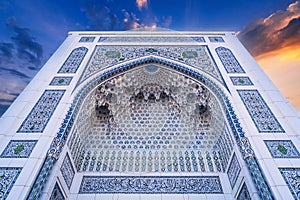 white marble tiles wall decorated traditional Uzbek Islamic pattern ornament on Minor Mosque in Tashkent in Uzbekistan