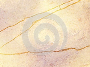 White marble or travertine with golden veins - abstract background