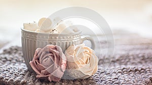 White marshmallows in a gray beautiful cup. romantic concept. A sweet Valentine's Day gift