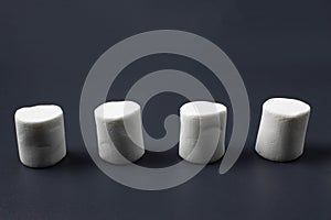 White marshmellow on dark background