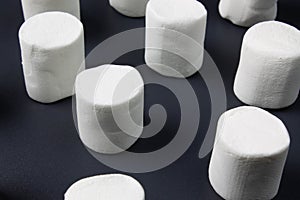 White marshmellow on dark background