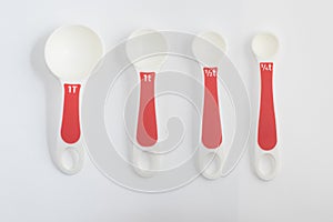 White Measuring spoon. Tablespoon and tea spoon