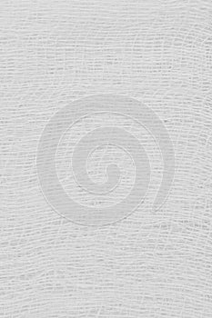 White medical bandage gauze texture, abstract textured background macro closeup, natural cotton linen fabric pattern, vertical