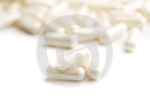 White medicine capsules.