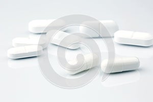 White medicine tablets, antibiotic pills
