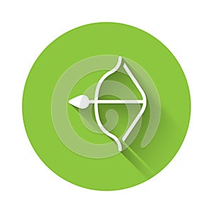 White Medieval bow and arrow icon isolated with long shadow. Medieval weapon. Green circle button. Vector