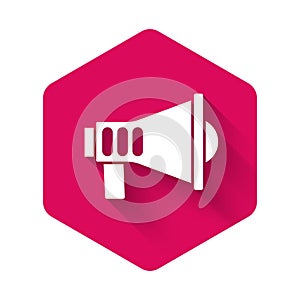 White Megaphone icon isolated with long shadow background. Speaker sign. Pink hexagon button. Vector