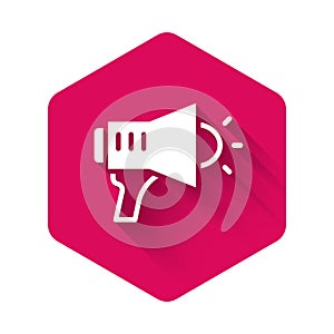 White Megaphone icon isolated with long shadow background. Speaker sign. Pink hexagon button. Vector