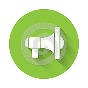 White Megaphone icon isolated with long shadow. Speaker sign. Green circle button. Vector