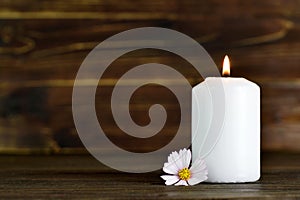 Memorial candle and flower photo