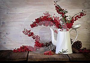 White Metal Coffee Pot with Red Berries