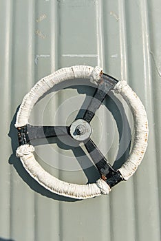 White metal door wheel, taken from battle ship water tight door