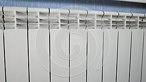 White metal heating iron household radiator inside room apartment