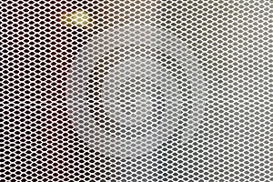 White metal mesh with small cells. Industrial background