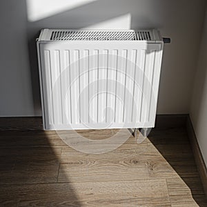 White metal radiator to heat the house and apartment