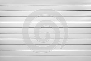 White metal roller shutter closed door. background or texture