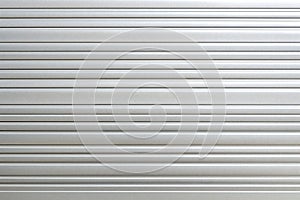 White metal roller shutter door texture background for graphic design or wallpaper