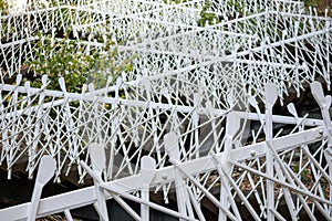 A white metal staircase zigzags up the mountain