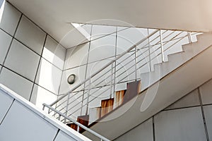 White metal stairways outside. Steel construction. Modern architecture. Minimalizm concept.