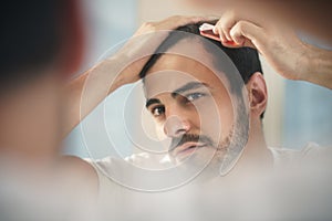 Young Man Applying Lotion For Alopecia And Hair Loss Treatment