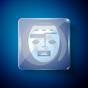 White Mexican mayan or aztec mask icon isolated on blue background. Square glass panels. Vector