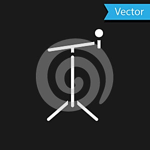White Microphone with stand icon isolated on black background. Vector