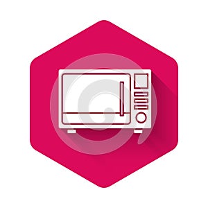 White Microwave oven icon isolated with long shadow. Home appliances icon. Pink hexagon button. Vector Illustration