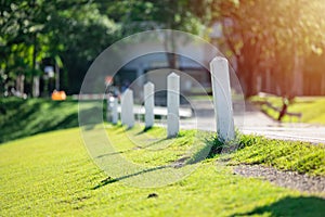 White milestone at country road side for target business step forward indicator concept