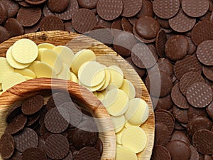 White, milk and dark chocolate discs