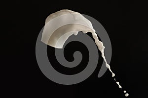 White milk splash black background