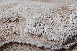 White Mineral Deposit on Desert Rocks