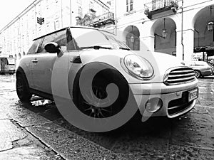 white Mini car in Turin in black and white