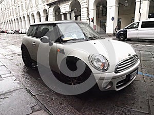 white Mini car in Turin
