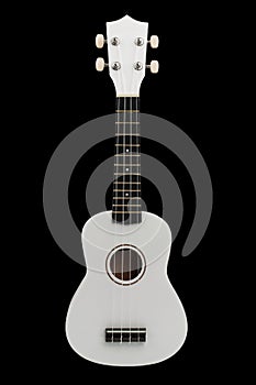 White miniature ukulele guitar with black neck insulated for clipping