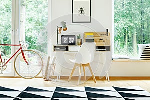 White modern chair at desk