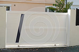 White modern design new street home door aluminum gate slats portal of suburb house