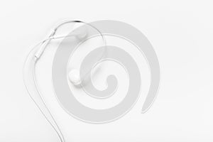 White modern headphones with a headset on a light gray background