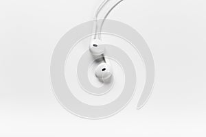 White modern headphones with a headset on a light gray background