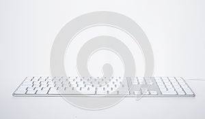 White modern keyboard on a white background
