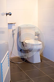 White modern toilet bowl in a bathroom