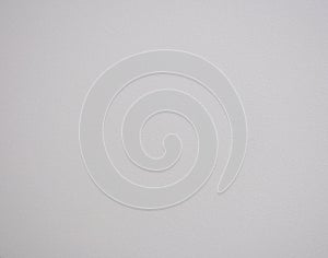 White monochrome surface with rough texture and veneering around the edges