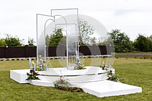 White monument in lush green field