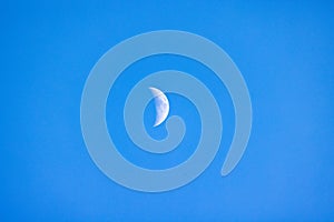Moon Crescent on a dark blue sky background