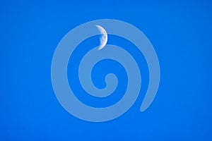 Moon Crescent on a dark blue sky background