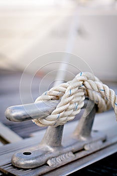 White mooring rope on ship photo