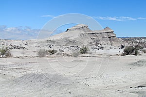 White mountain in desert photo