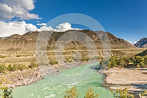 White mountain river in Altai. Summer View of Altai, Russia. Altai Republic is one of Russia`s ethnic republics. Altay