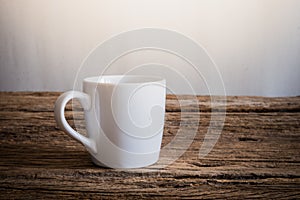 White mug on wooden tabletop