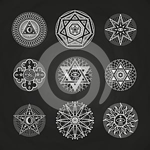 White mystery, occult, alchemy, mystical esoteric symbols on blackboard