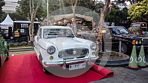 White Nash metropolitan classic car in car meet